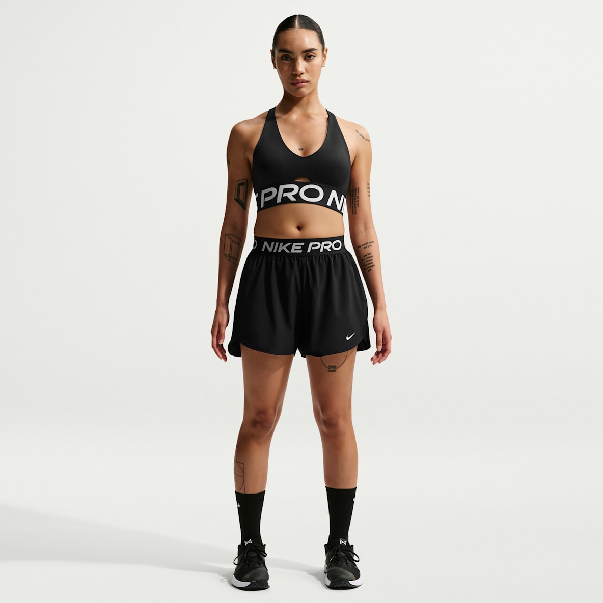 Nike Pro Short tissé taille mi-haute avec sous-short intégré Dri-FIT 8 cm pour femme