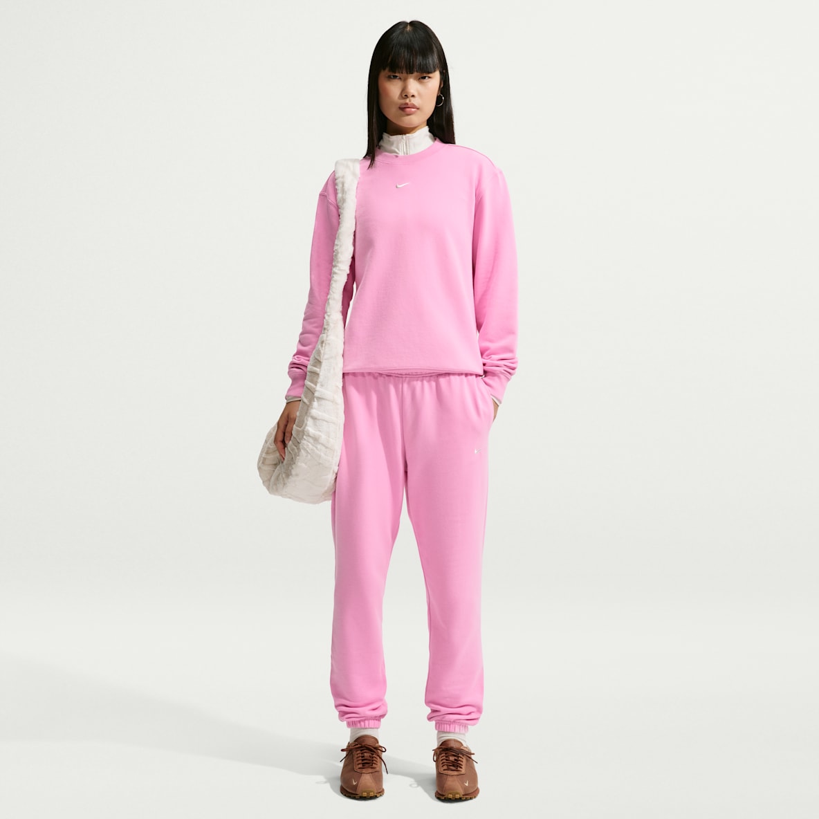 Nike Studio Fleece Lightweight "French Terry" Pants de tiro medio con puño para mujer